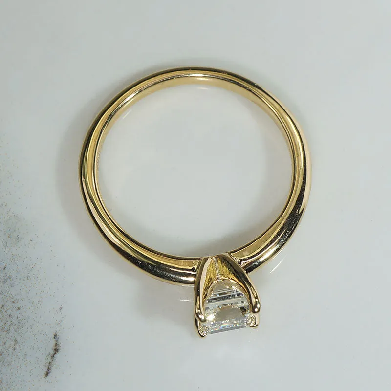 Exquisite Step-Cut Diamond in Gold Solitaire by 720