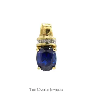 Oval Sapphire Pendant with Diamond Accents in 10k Yellow Gold