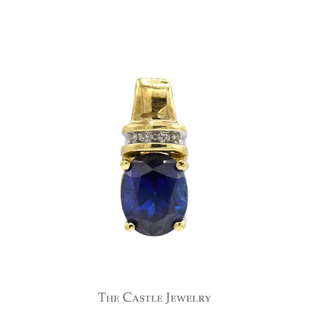Oval Sapphire Pendant with Diamond Accents in 10k Yellow Gold