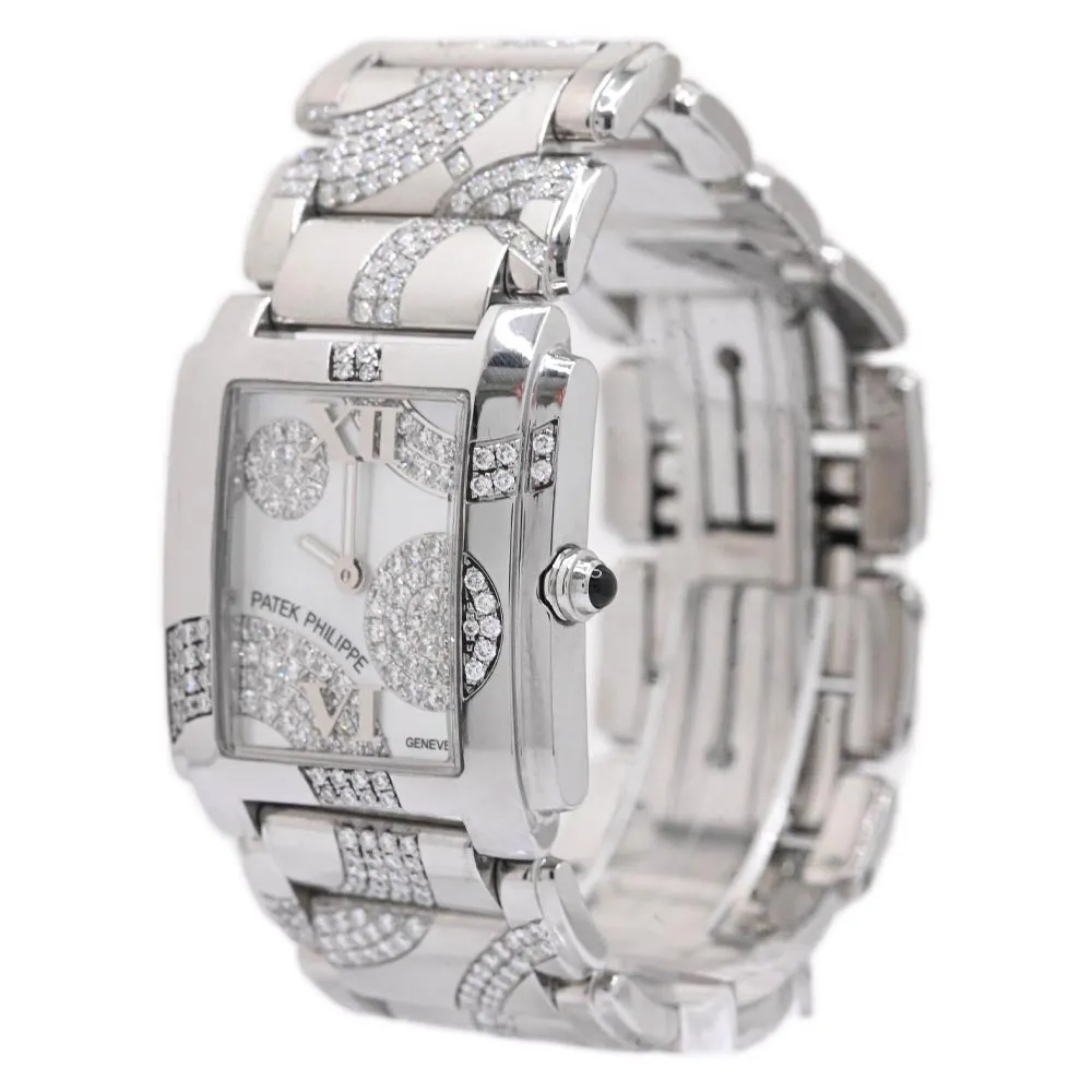 Patek Philippe Ladies Stainless Steel25mm White MOP Roman Dial Watch Reference #: 4910/49G-001