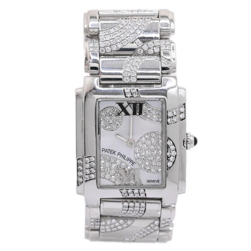 Patek Philippe Ladies Stainless Steel25mm White MOP Roman Dial Watch Reference #: 4910/49G-001