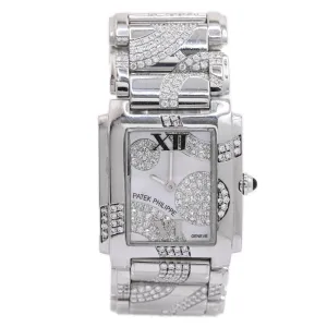 Patek Philippe Ladies Stainless Steel25mm White MOP Roman Dial Watch Reference #: 4910/49G-001