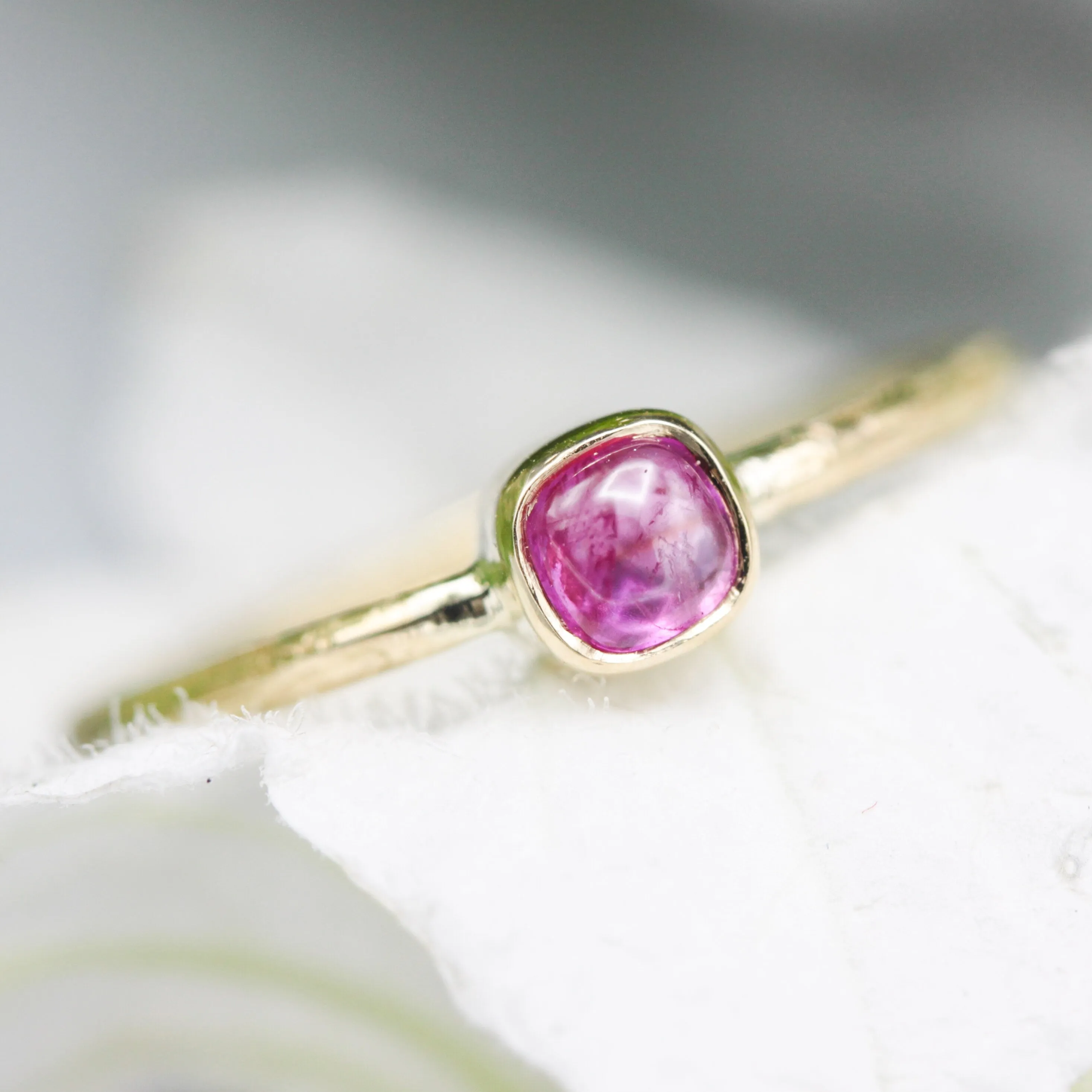 Square pink sapphire ring in bezel setting with 18k gold texture band