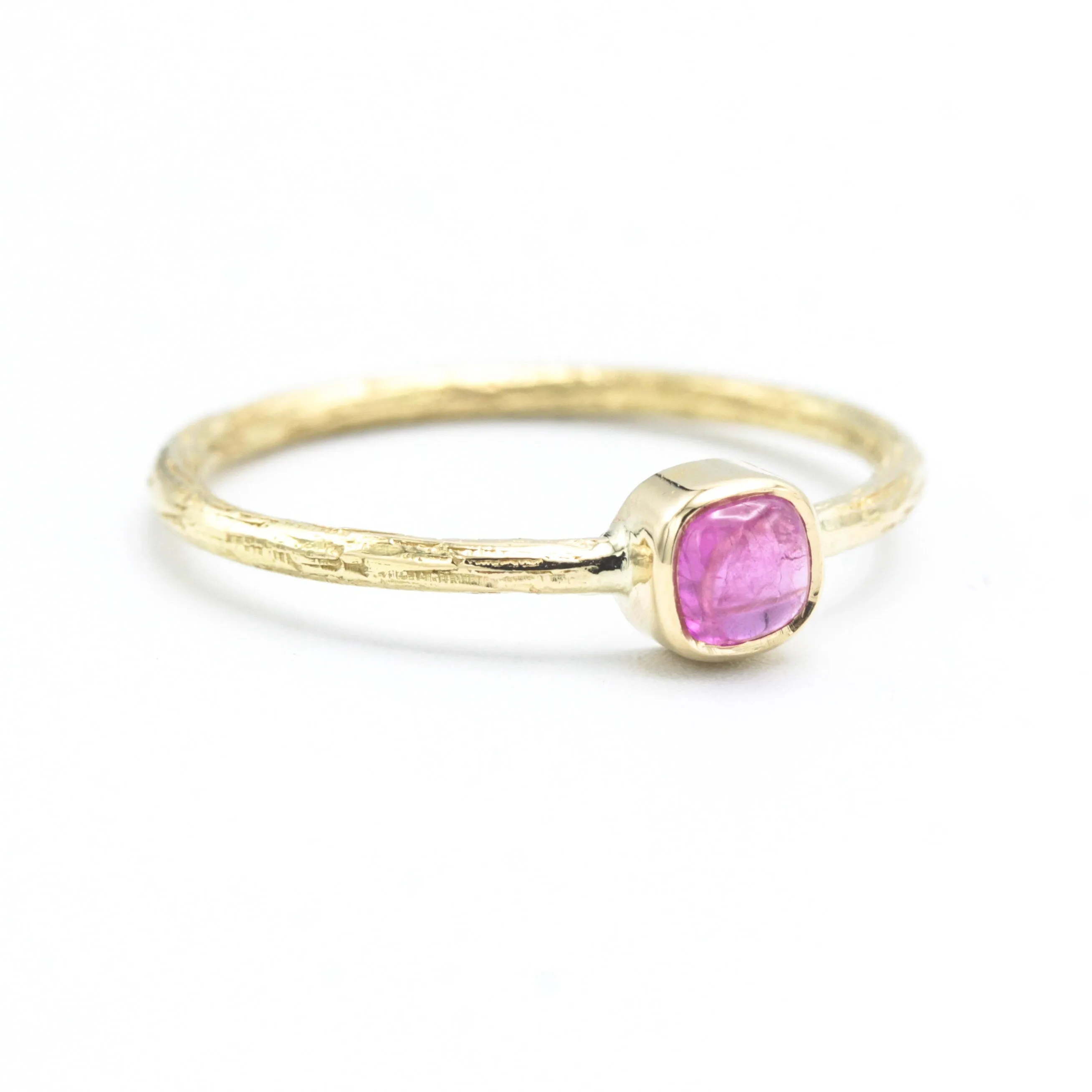 Square pink sapphire ring in bezel setting with 18k gold texture band