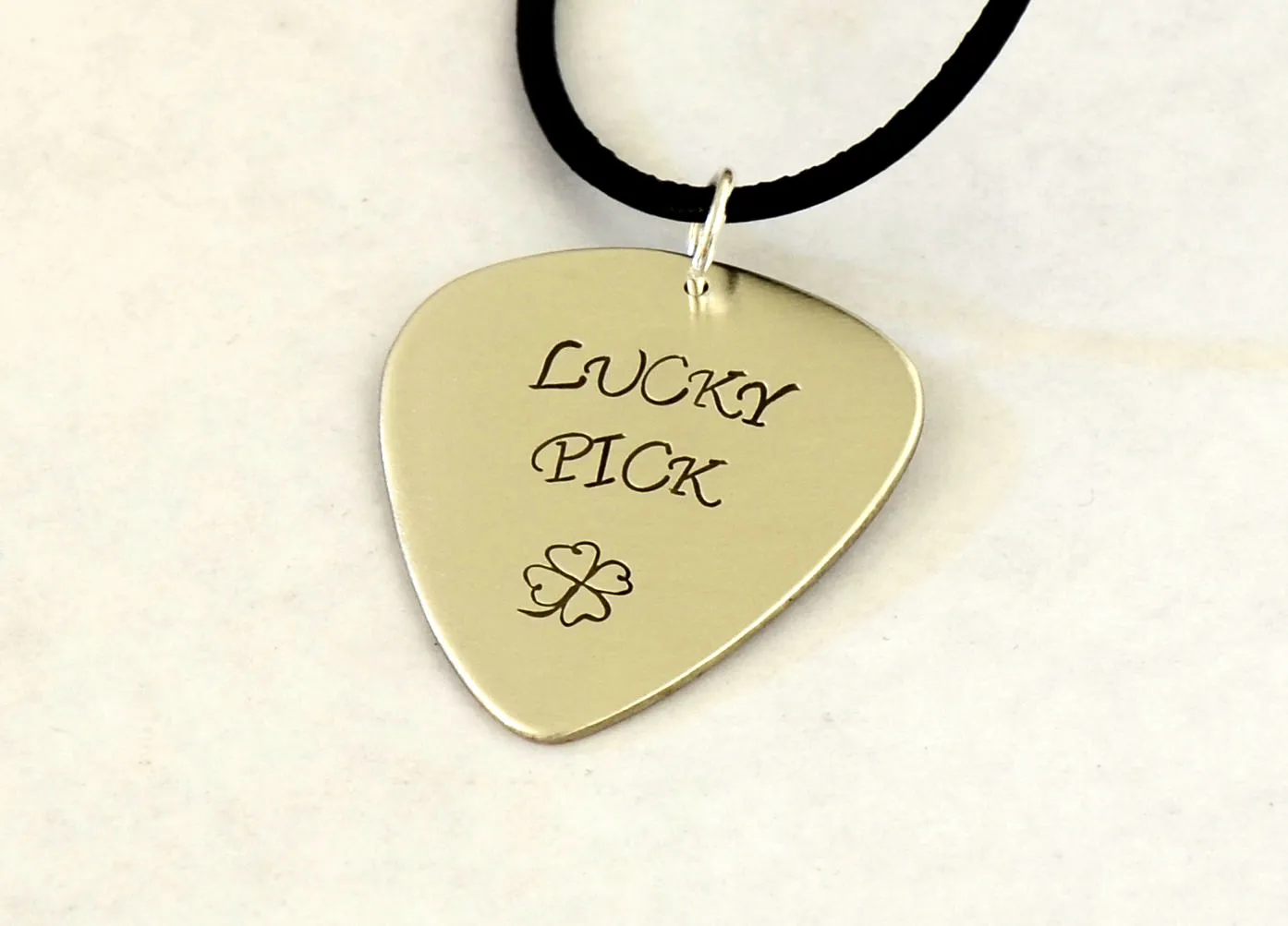 Sterling Silver Lucky Pick Guitar Pick Necklace