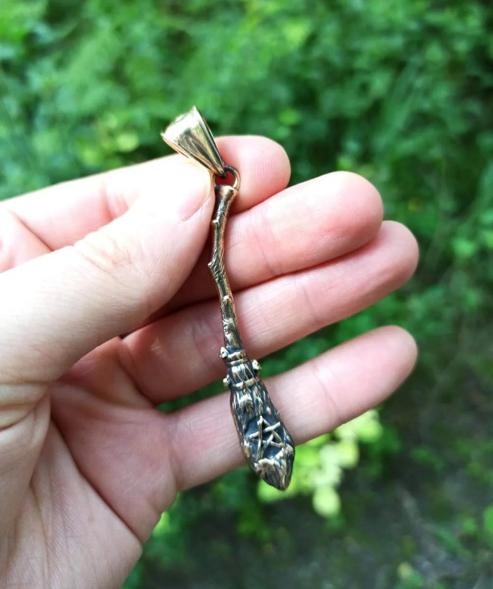 Witch broom bronze pendant