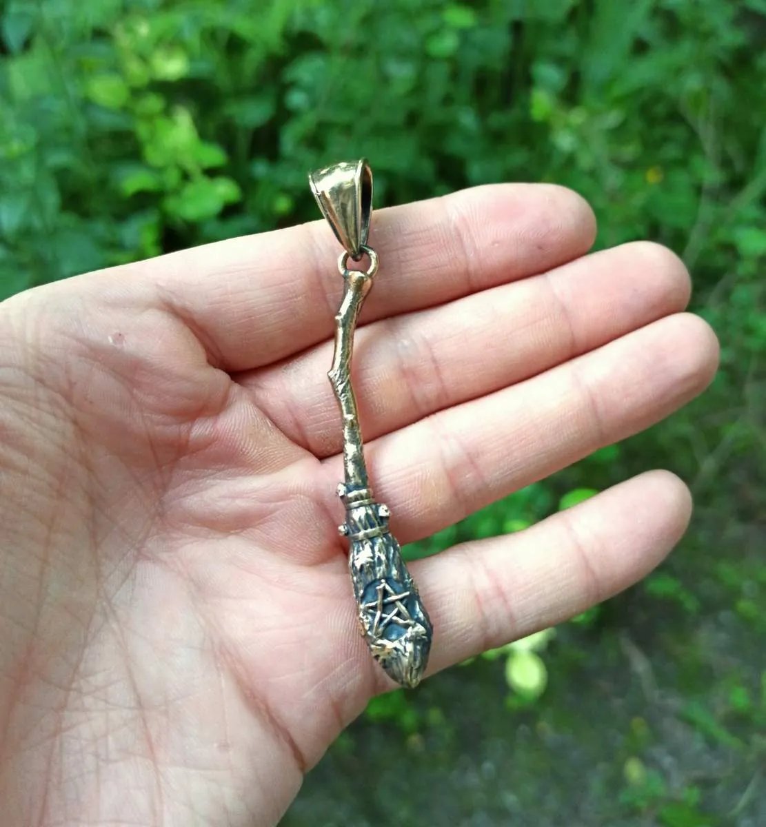 Witch broom bronze pendant