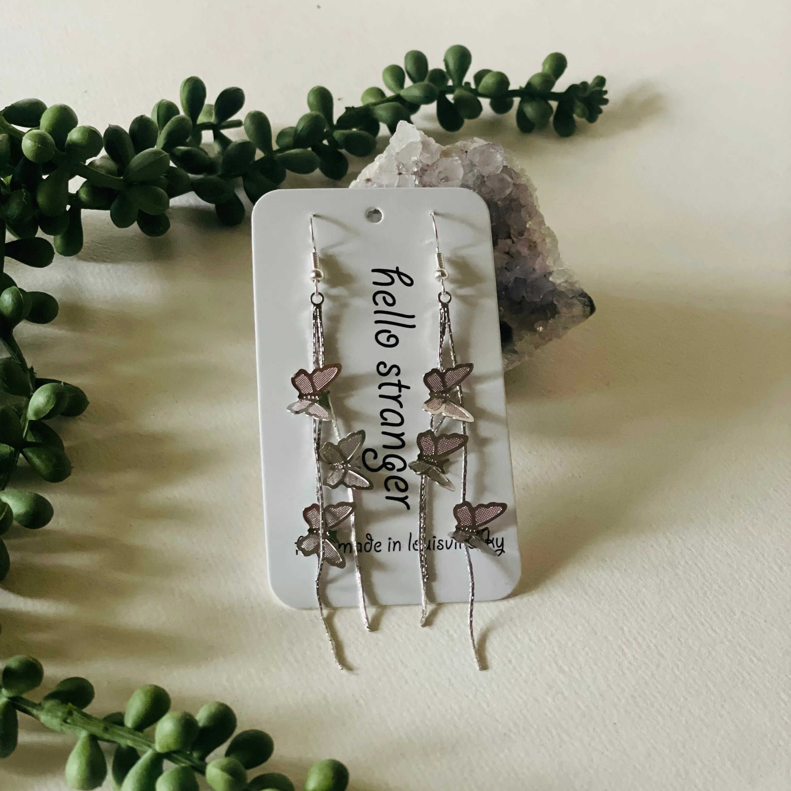 Y2K style butterfly waterfall earrings in silver // hello stranger